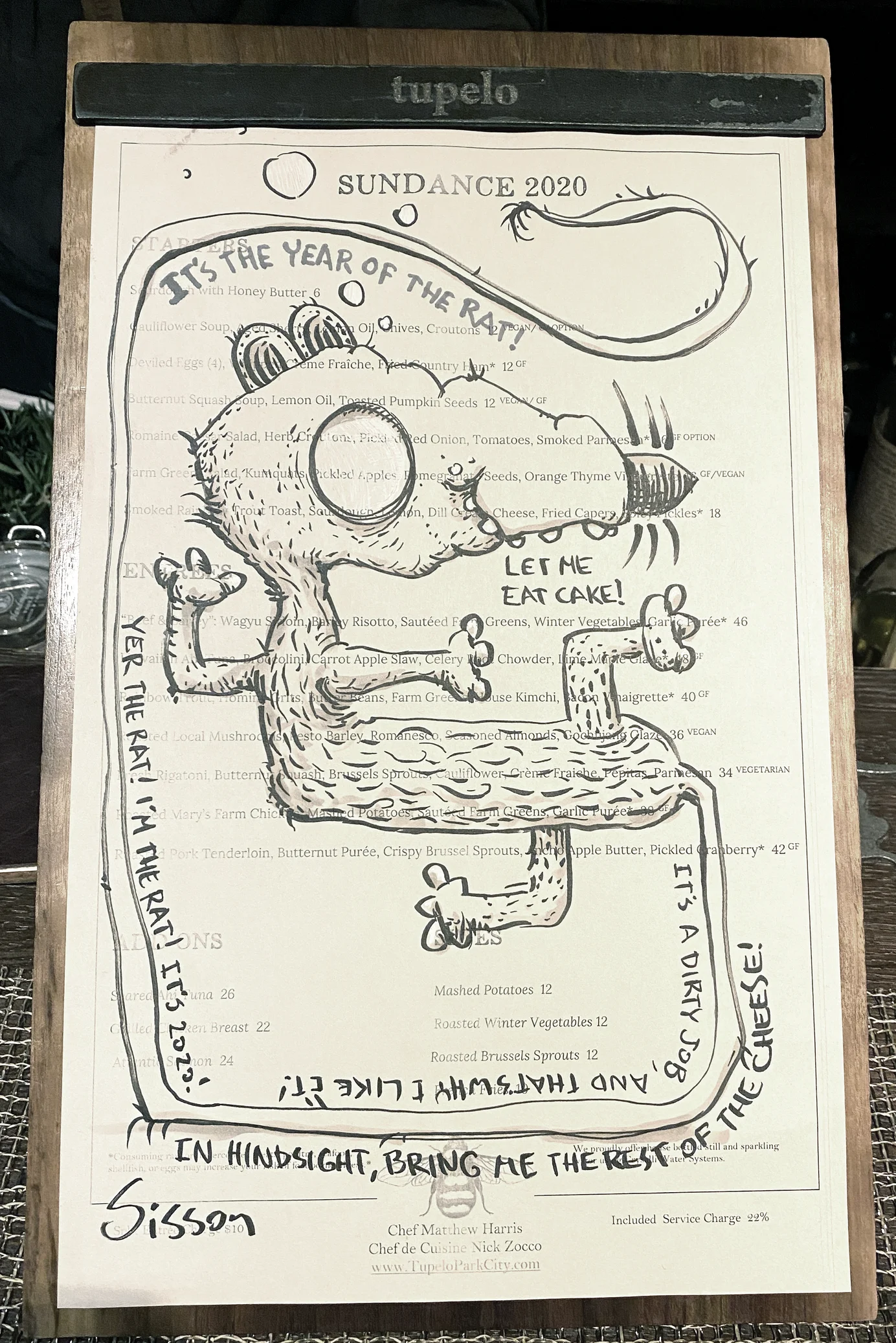 A Sundance 2020 restaurant menu covered by a loose black ink drawing of a wide-eyed rat with a long looping tail.
