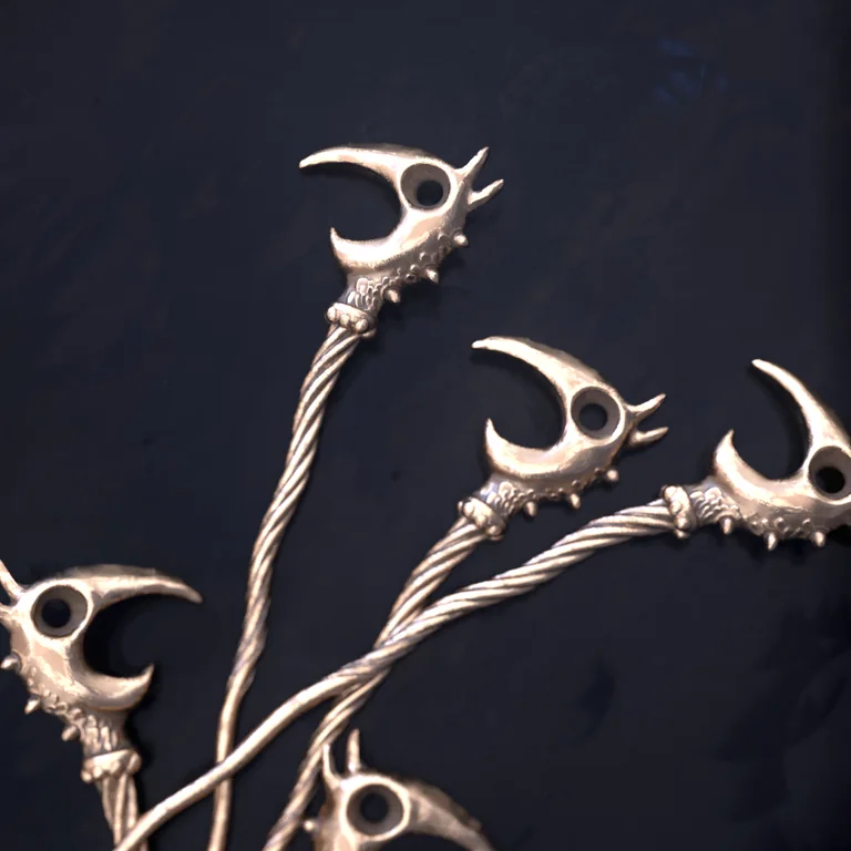 Four RenderMan views of the first digital Dragon Pick model.