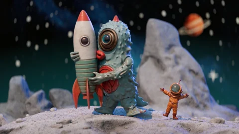 Starstruck by Dylan Sisson: a blue space monster holding a rocket beside a small astronaut beneath a starry sky.